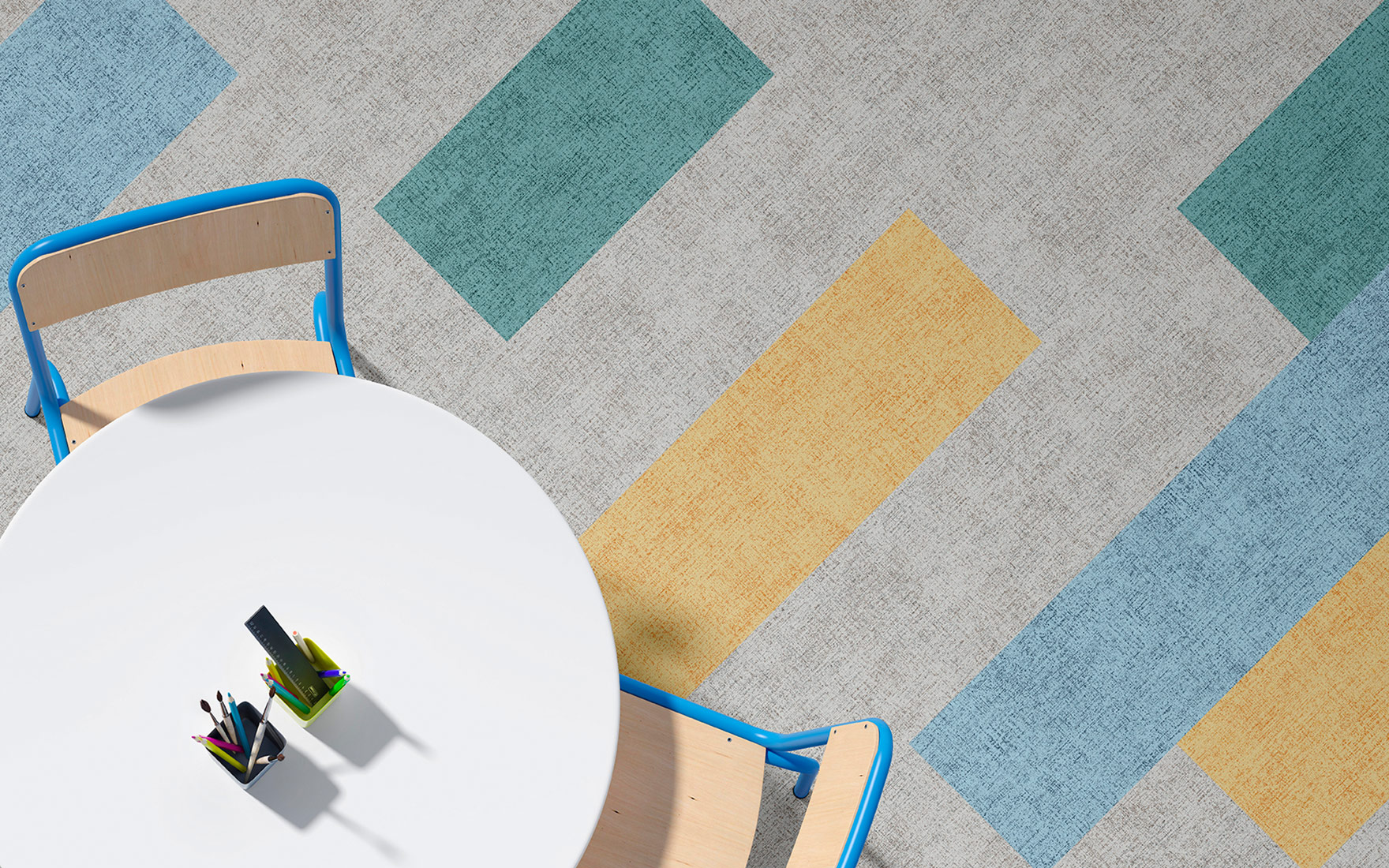 Colorful LVT flooring styled interior with table  